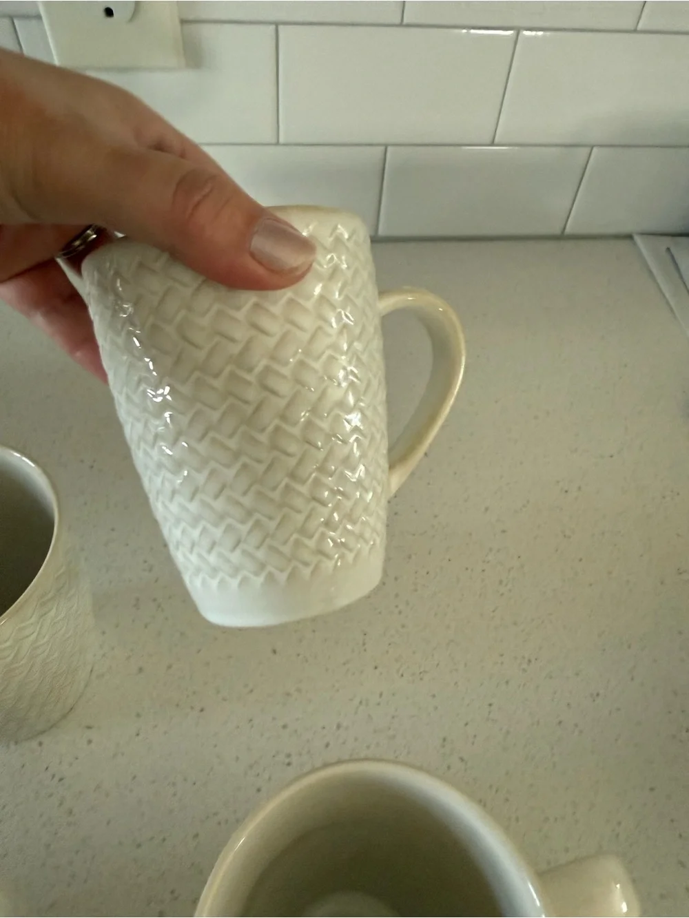 4 white basketweave Crate and Barrel mugs